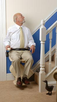 Elderly person on a Brooks stairlifts